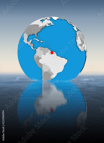 Suriname on globe in water