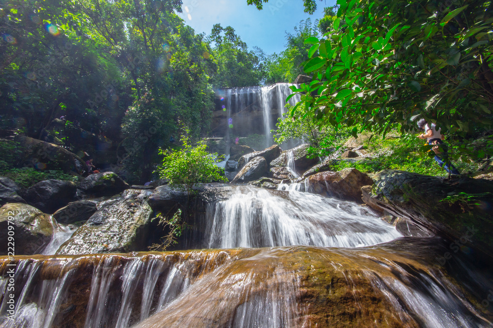 Beautiful waterfalls flow through the rocks in  forest at Soo Da Cave Roi et Thailand