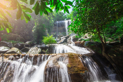 Beautiful waterfalls flow through the rocks in forest at Soo Da Cave Roi et Thailand