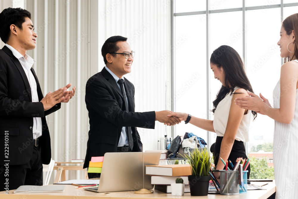 Fototapeta premium Happy Businesspeople are shaking hands together after finish meeting with successful.