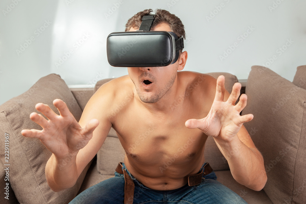 Virtual sex in VR glasses. Man is naked and in VR glasses of virtual reality  has sex Stock Photo | Adobe Stock