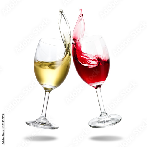Cheers wine with splash out of glass isolated on white background.