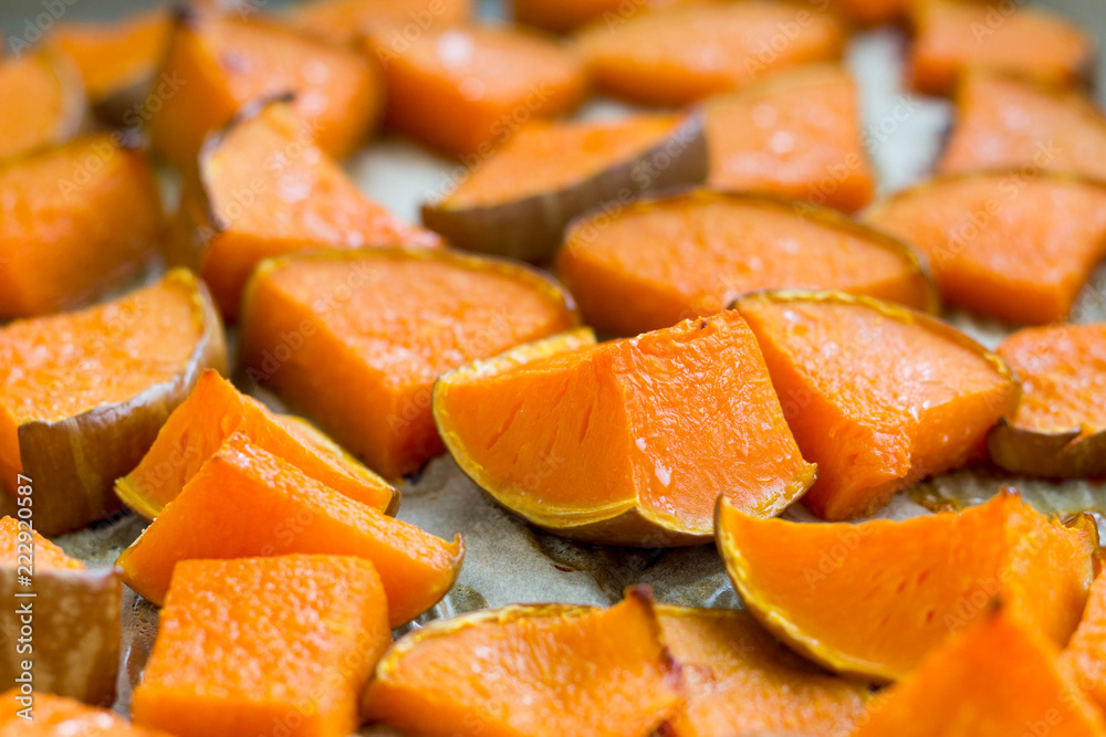 Freshly baked pumpkin on baking sheet. Freshly baked pumpkin on baking sheet.