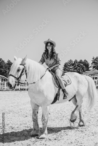 Young pretty woman hugging her horse - Concept about love between people and animals . Beautiful lady lifestyle with best friend horse in countryside. Portrait of human and animals for pet life 