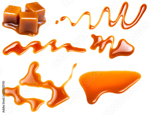 Tableau sur toile Caramel splashes isolated on white background