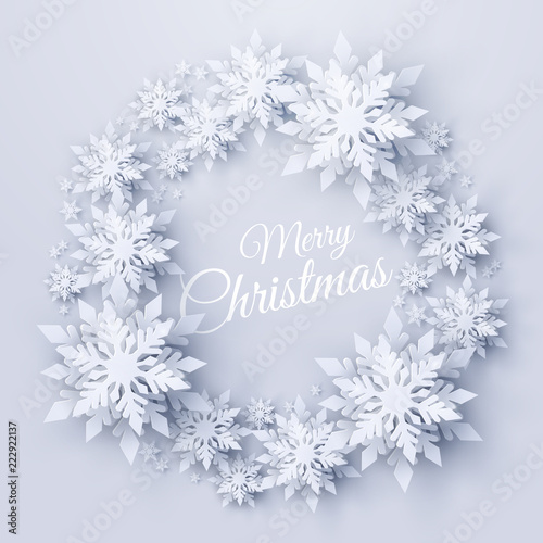 Vector Merry Christmas and Happy New Year background with christmas wreath made of realistic looking paper cut snowflakes. Seasonal winter holidays greeting card