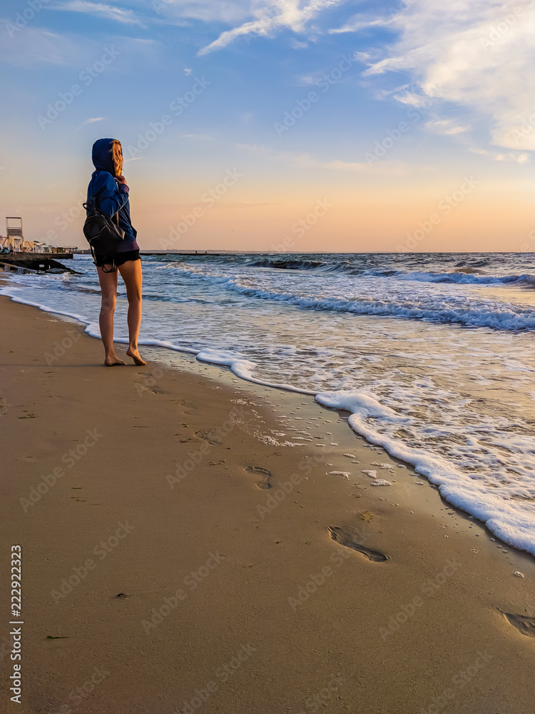 Sunset on the sea beach with stones Sunset on the sea beach with stones