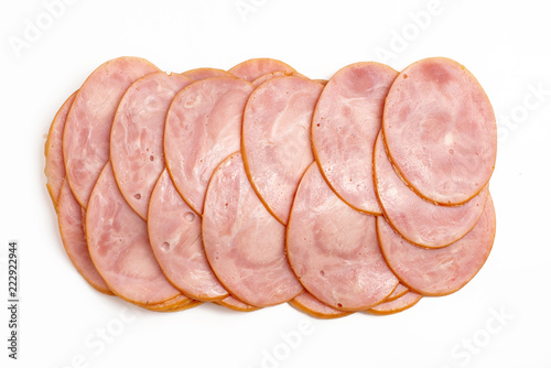 Fototapeta Naklejka Na Ścianę i Meble -  Sliced boiled ham sausage isolated on white background, top view