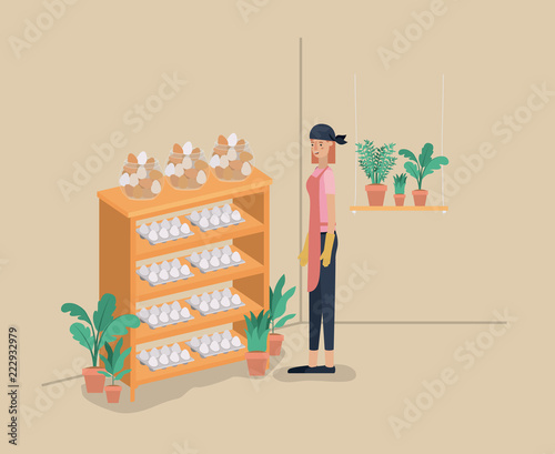 woman with plants vivarium in shelving