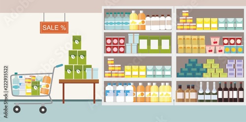 Supermarket interior with commodity product on shelf and shopping cart