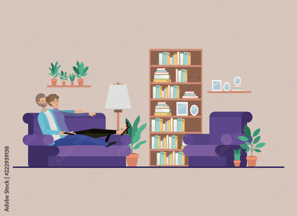 Fototapeta premium young couple watching tv on the livingroom