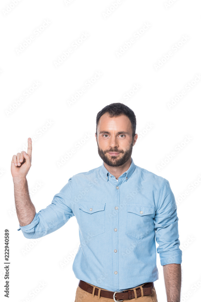 man in blue shirt pointing up isolated on white man in blue shirt pointing up isolated on white