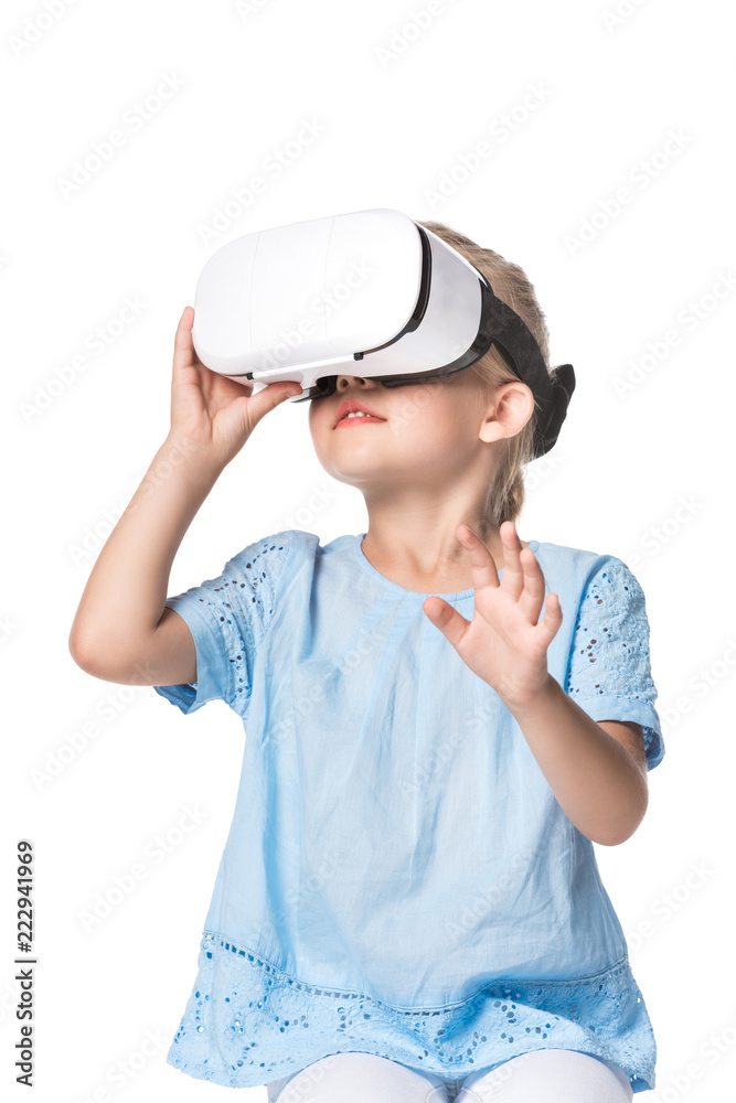 child using virtual reality headset isolated on white child using virtual reality headset isolated on white