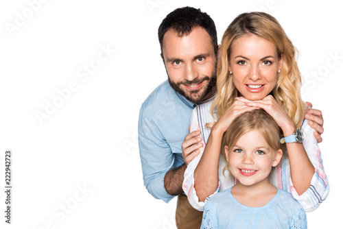smiling family looking at camera isolated on white