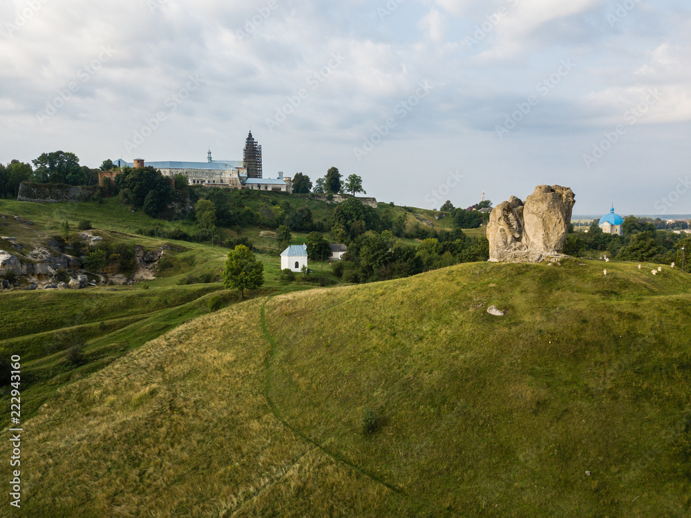 Devil's rock in Pidkamin, Lviv region, West Ukraine summer landscape