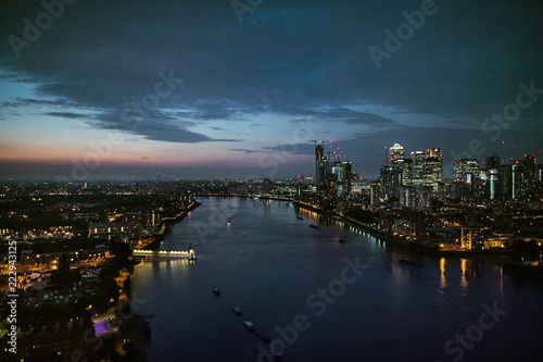 A dusk over a skyline of London with the river Thames. © Halfpoint