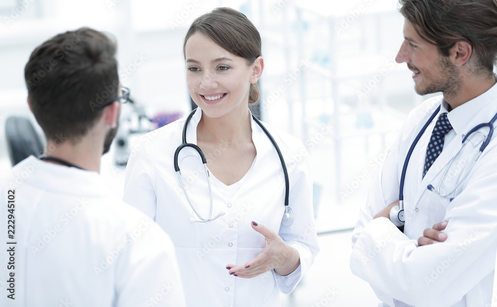 Team of different doctors having conversation Team of different doctors having conversation