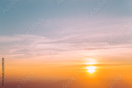 Dramatic sunset and sunrise over mountain morning evening sky. © sirins
