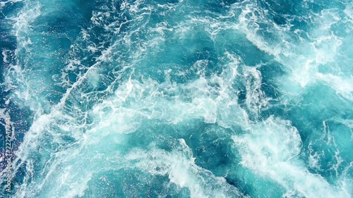 White foaming sea water comming out from ferry boat jet powered engine. Filmed on vacation trip to Croatian island Pasman.