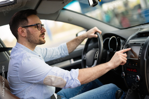 Man Using Gps Navigation System In Car © NDABCREATIVITY