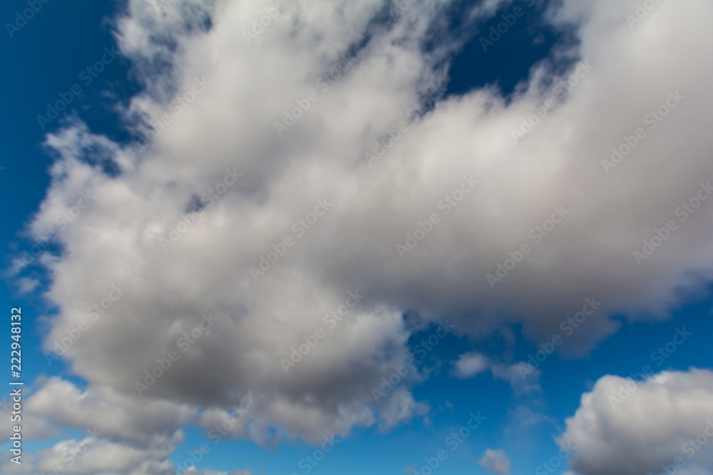 Fototapeta premium A big cloud in the blue sky.