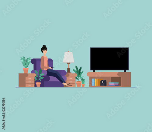 young woman watching tv on the livingroom