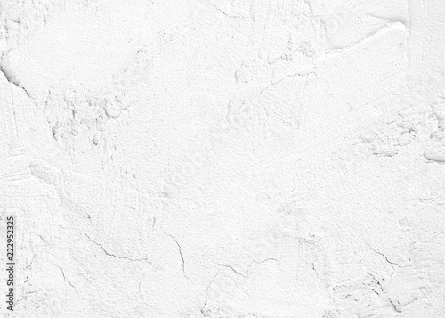 White cement texture plastered stucco wall painted fade background.