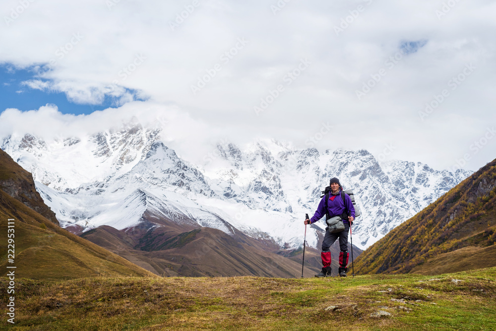 Tourist in a mountain trekking near the top of Shkhara, Svaneti Georgia Tourist in a mountain trekking near the top of Shkhara, Svaneti Georgia