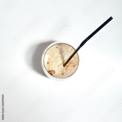 Macro Photo of Nut Smoothie with Walnut Milk, Pears and Banana Isolated on White Background