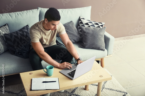 Young freelancer working on...
