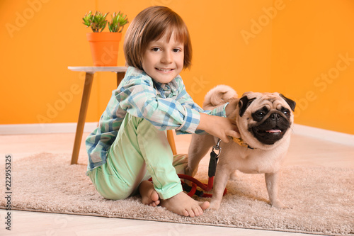 Little boy sitting with cut...