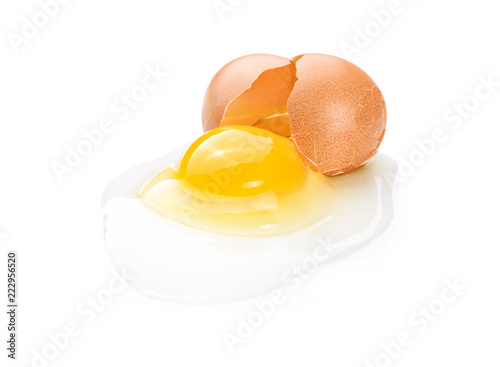 Broken brown chicken egg isolated on white background, closeup.