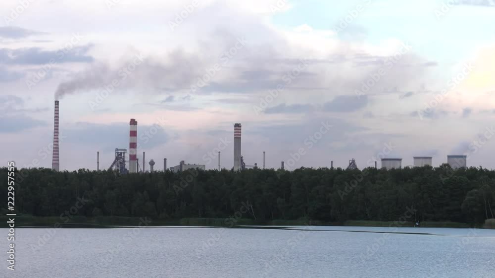 Construction of a large coal-fired power plant. A large cooling tower in the area of a large power plant Construction of a large coal-fired power plant. A large cooling tower in the area of a large power plant