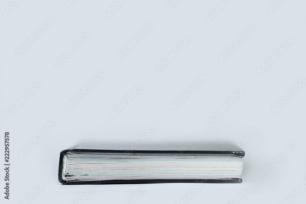 closed book in black cover.photo with copy space closed book in black cover.photo with copy space