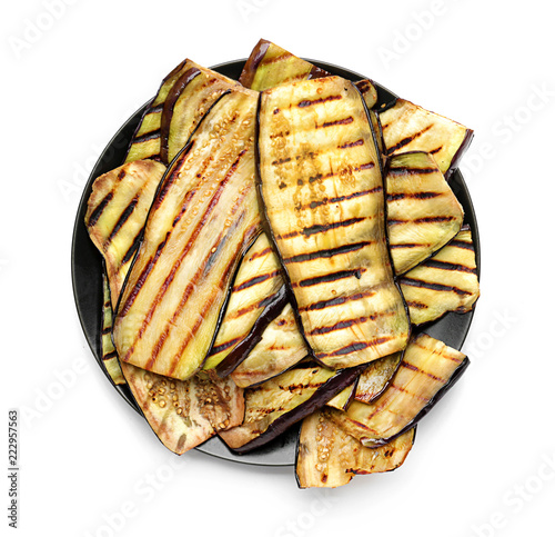 Plate with tasty grilled eggplant on white background