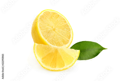 Cut ripe lemon on white background