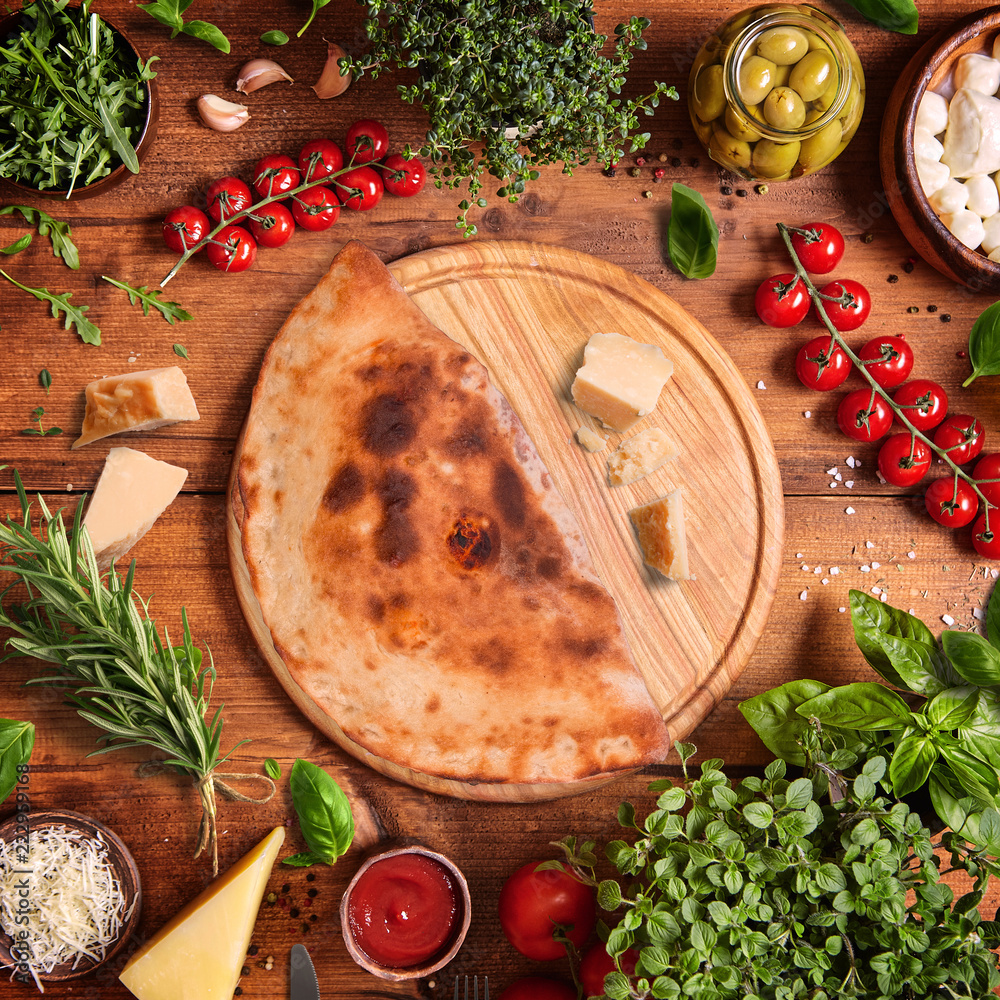 Italian PIZZA top view with vegetables background Italian PIZZA top view with vegetables background