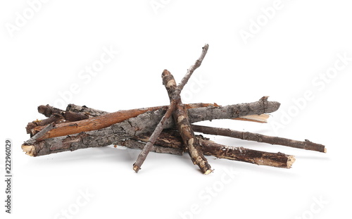 Dry and rotten branches, piled up, isolated on white background