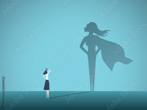 Businesswoman with superhero shadow vector concept. Business symbol of emancipation, ambition, success, motivation, leadership, courage and challenge. photo