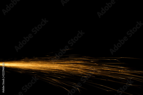 the tail of a fiery comet on a black background