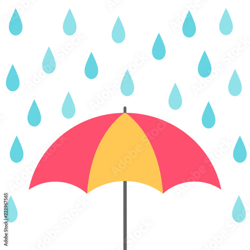 Rain falling on the colorful umbrella