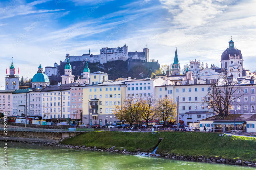 Beautiful panoramic view of Salzburg, Salzach river and Festung Hohensalzburg fortress in autumn, Salzburg, Salzburger Land, Austria Beautiful panoramic view of Salzburg, Salzach river and Festung Hohensalzburg fortress in autumn, Salzburg, Salzburger Land, Austria