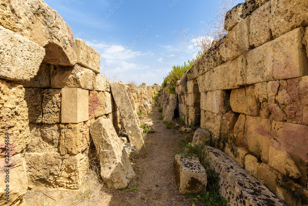 Ruins of the fortifications of the Acropolis inside the archaeological park of Selinunte, an ancient Greek city on a seaside hill in the south west coast of Sicily.