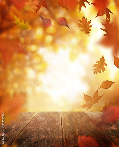 Autumn Falling Leaves and Wooden Table