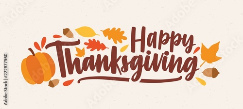 Happy Thanksgiving festive phrase or wish handwritten with calligraphic script and decorated by squash, fallen foliage and acorns. Colorful autumn vector illustration in flat style for holiday banner.