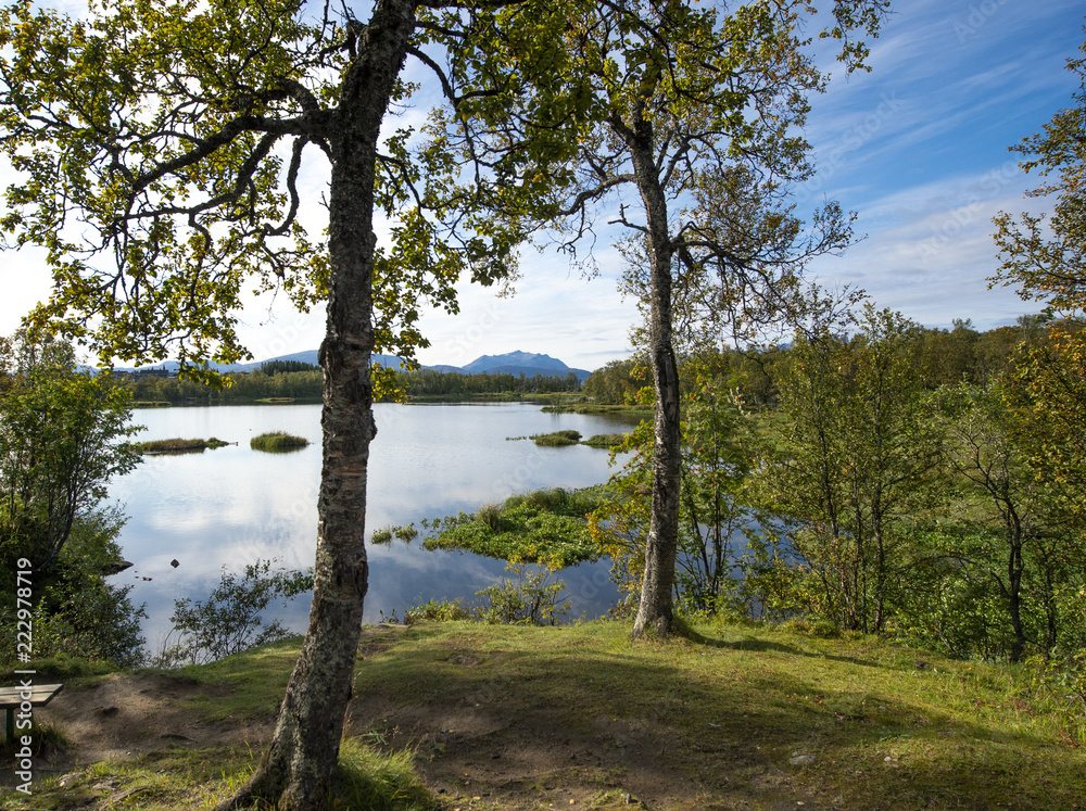 The beautiful lake in autumn paints. Tromso. Prestvann The beautiful lake in autumn paints. Tromso. Prestvann