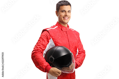 Racer with a helmet looking at the camera and smiling