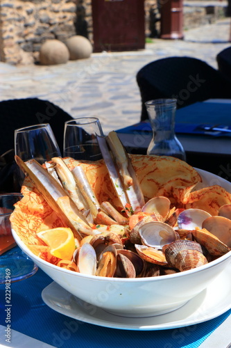 Plate of seafood on the table of a french restaurant
 photo