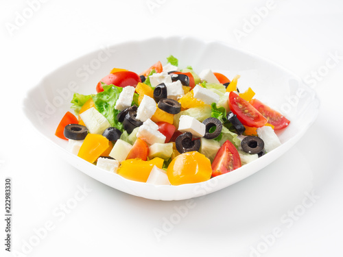 Greek salad "Horiatica" on a white plate