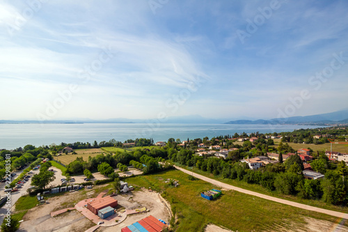 Garda Lake and high mountain in background. View from observation desk in GardaLand, Lombardy, Italy © johnkruger1